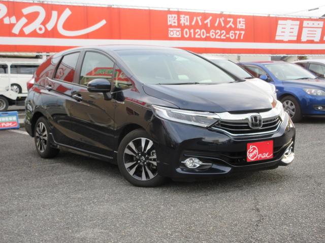 シャトル(ホンダ) ハイブリッドX ホンダセンシング 1年走行無制限保証 除菌シートクリーニング 純正8インチナビ バックカメラ フルセグTV Bluetooth DVDビデオ LEDヘッドライト アダプティブクルーズ シートヒーター プッシュスタート 中古車画像