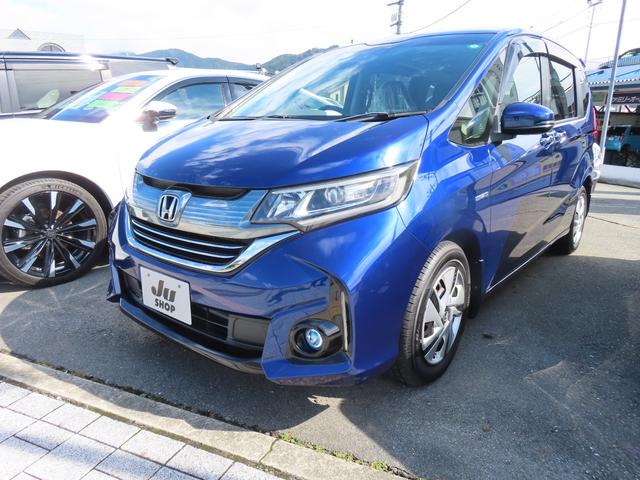 フリードハイブリッド(ホンダ) ハイブリッドB ETC バックカメラ ナビ オートクルーズコントロール レーンアシスト 衝突被害軽減システム 両側電動スライドドア オートライト 3列シート AT ESC エアコン パワーステアリング 中古車画像