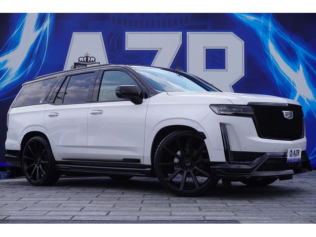 キャデラックエスカレード キャデラック プラチナム 新車並行車 プラチナム ｚｅｒｏｄｅｓｉｇｎフルカスタム車両 ｓｋｙｆｏｒｇｅｄ２６インチホイール カスタムラッピング スポーツグリル オプションエンブレム 可変式マフラー ａｋｇスピーカー 愛知県