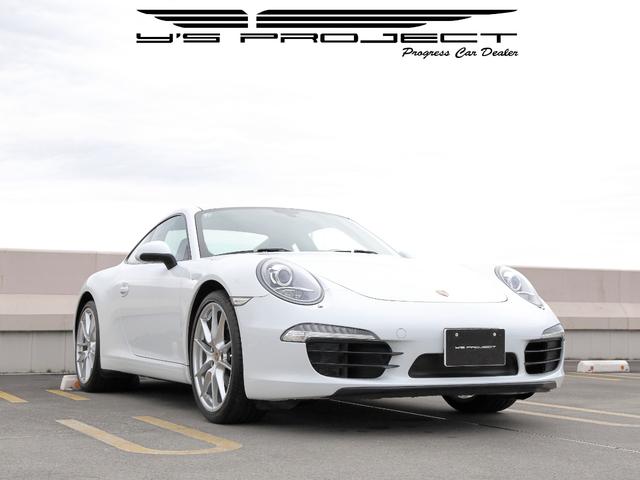 ９１１カレラ　左ハンドル／７速ＭＴ車／電動格納式ドアミラー／２０インチカレラＳホイール／カラークレストホイールセンターキャップ／バイキセノンヘッドライト／純正ナビ／フルセグＴＶ／ＥＴＣ／社外オービスレーダー