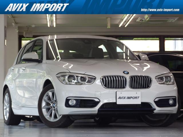１シリーズ(BMW) １１８ｉ　スタイル　後期型　Ｄアシスト　銀灰半革　ＨＤＤナビ　AftermarketＢカメラ　Ｂｌｕｅｔｏｏｔｈ　タッチパッド　ＬＥＤヘッドライト　ＬＤＷ　衝突回避・被害軽減ブレーキ　分割可倒式シート　ホワイトアクリルガラスパネル　禁煙 中古車画像