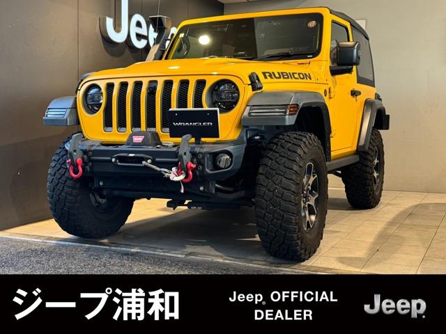 ジープ・ラングラー ルビコン・ソフトトップ ワンオーナー 認定中古車 ドライブレコーダー 禁煙車 マッドテレーンタイヤ 地上デジタルチューナー LEDヘッドライト シートヒーター(1枚目)