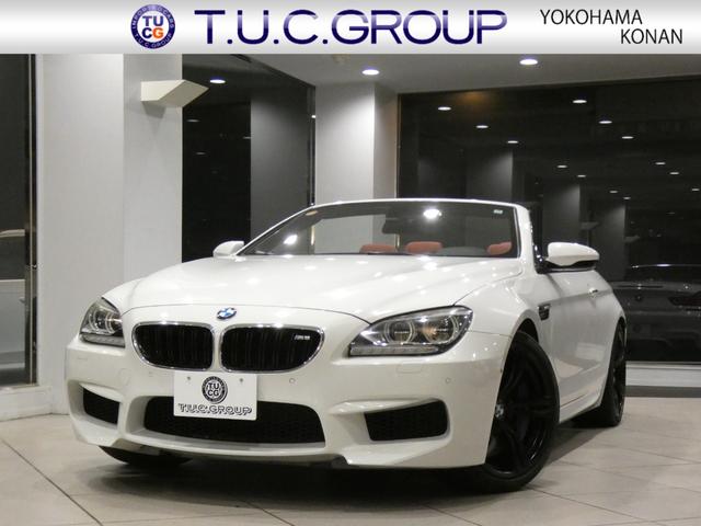 M6カブリオレ（BMW）カブリオレ　左Ｈ／コンフォＡ／赤革／黒幌／マッサージ／ヒーター＆ベンチレーター／Ｂ＆Ｏサウンド／ｉドライブナビ／ＢＴオーディオ／トップビュー・サイドビュー／ＬＥＤライト／専用エクステリア＆２０ＡＷ／２年保証 中古車画像