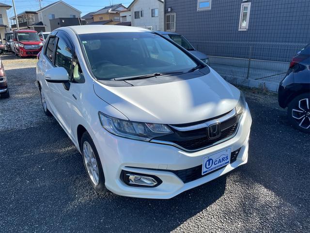 フィットハイブリッド(ホンダ) Ｌ　ホンダセンシング　グー保証、一年間、走行距離無制限付、グー故障診断付き、衝突軽減装置付き、純正ナビ、ＴＶ、バックカメラ、ＥＴＣ、スマートキー、バッテリー新品交換付 中古車画像