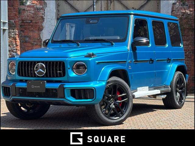 Gクラス（AMG）Ｇ６３　ＭＡＮＵＦＡＫＴＵＲプログラムプラス／ハイパーブルーマグノ／ＡＭＧカーボンインテリア／インテリアプラスＰＫＧ／２１インチＡＭＧホイール／ボディ同色背面カバーリング／ベージュシートベルト／サンルーフ／ 中古車画像