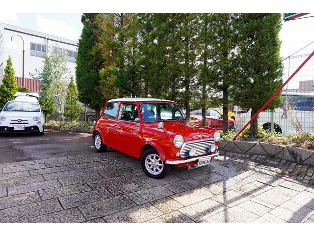 ＭＩＮＩ クーパー　１．３　ＡＴ　ブラックレザーシート　コンビハンドル　記録簿　スペアキー有　１２インチアルミホイール　禁煙車　カセット　ディーラー車（1枚目）