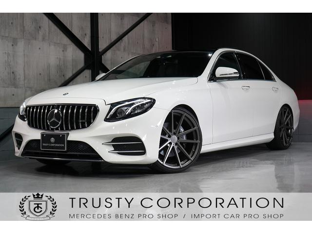 ｅクラス メルセデス ベンツ ｅ２２０ｄ アバンギャルド スポーツ レザーエクスクルーシブ パノラミックスライディングルーフ ｔｓｗ２１インチホイール ダウンサス ダイヤモンドグリル ブルメスター パワーオートトランク エアコンルーバー 黒本革シート レーダー