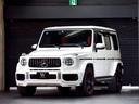 Ｇクラス Ｇ６３　ＡＭＧレザーエクスクルーシブパッケージ　ＡＭＧ２２ＡＷ　ＢＲＡＢＵＳリップ　パワークラフトマフラー（純正あり）　レッドレザーエクスクルーシブ　スペアタイヤ背面カーボン　記録簿・スペアキー完備　禁煙（1枚目）