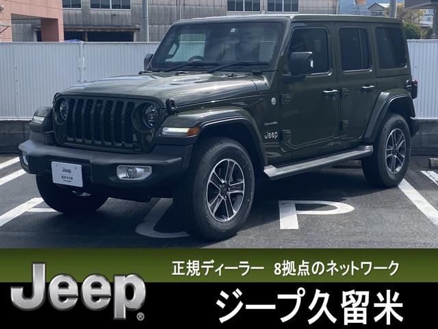 ジープ・ラングラーアンリミテッド サハラ　登録済未使用車　ブラックレザー　ＡｐｐｌｅＣａｒＰｌａｙ／ＡｎｄｒｏｉｄＡｕｔｏ対応純正ナビＴＶ　バックカメラ　純正１８インチアルミ　シート＆ステアリングヒーター　追従式クルーズコントロール