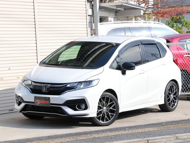 フィットハイブリッド(ホンダ) Ｓ　ホンダセンシング　純正８インチメモリーナビ　フルセグ　ＤＶＤ視聴　バックカメラ　パイオニアウーファー　ＬＥＤヘッドランプ　Aftermarket１７インチＡＷ　純正ＡＷ付スタッドレスＢＳＶＲＸ３　ドラレコ　スマートキー　スペアキー 中古車画像