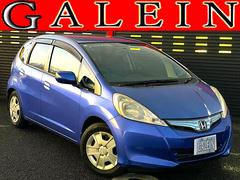 フィットハイブリッド ベースグレード 実走3.2万km/禁煙車/エンジンスターター/ナビ/テレビ/USB/クルコン/キーレス/CD&DVD/オートエアコン/ステアスイッチ/ミラーウィンカー/ドアバイザー/PVガラス/電格ミラー/Tチェ-ン 中古車画像