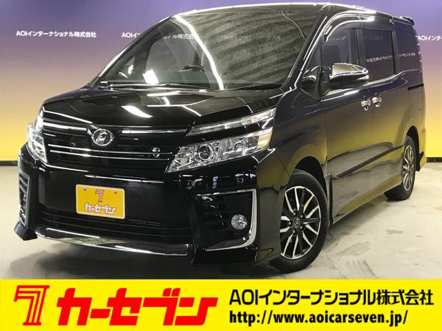 トヨタ ヴォクシー ＺＳ　煌　１０インチＳＤナビ　フルセグＴＶ　ＬＥＤオートライト　両側パワースライド　バックカメラ　ＤＶＤ　ＢＴ　ＳＤ　ＣＤ　ＥＴＣ　インテリジェントキー　ウッド調コンビステアリング　黒シートカバー