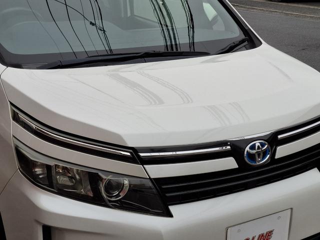 ヴォクシー ハイブリッドＶ　禁煙車　両側パワースライド　オートライト　ＬＥＤライト　シートヒーター　スマートキー　デュアルエアコン　９型ナビ　フルセグＴＶ　Ｂｌｕｅｔｏｏｔｈ　バックカメラ　ＥＴＣ　１１型フリップダウン　クルコン（48枚目）