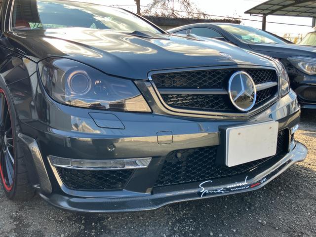 Cクラス C63 AMGクーペ パフォーマンスパッケージ 車高調ローダウン 社外エアロ 可変中間マフラー 純正ナビ フルセグTV バックカメラ ヒーター付電動シート キセノンヘッドライト ETC 19インチアルミホイール 禁煙車(37枚目)