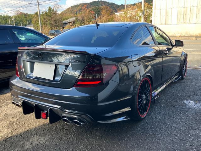 Cクラス C63 AMGクーペ パフォーマンスパッケージ 車高調ローダウン 社外エアロ 可変中間マフラー 純正ナビ フルセグTV バックカメラ ヒーター付電動シート キセノンヘッドライト ETC 19インチアルミホイール 禁煙車(38枚目)