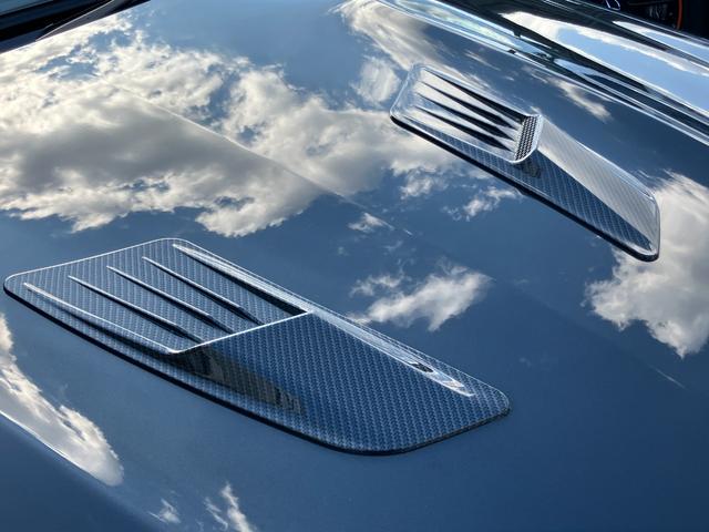 Cクラス C63 AMGクーペ パフォーマンスパッケージ 車高調ローダウン 社外エアロ 可変中間マフラー 純正ナビ フルセグTV バックカメラ ヒーター付電動シート キセノンヘッドライト ETC 19インチアルミホイール 禁煙車(50枚目)