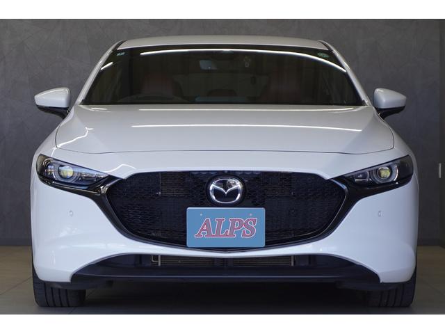 MAZDA3ファストバック 20Sバーガンディ セレクション ユーザー買取車 ナビ 全方位カメラ ETC DVD/地デジ 前後ドラレコ LEDヘッドランプ クリアランスソナー ステアリングヒーター シートヒーター スマートキー(3枚目)