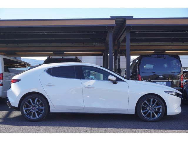 MAZDA3ファストバック 20Sバーガンディ セレクション ユーザー買取車 ナビ 全方位カメラ ETC DVD/地デジ 前後ドラレコ LEDヘッドランプ クリアランスソナー ステアリングヒーター シートヒーター スマートキー(6枚目)