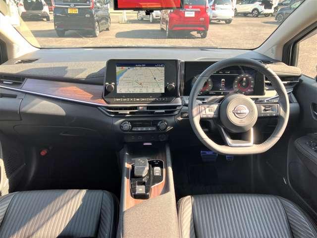 オーラ １．２　Ｇ　レザーエディション　メ－カ－装着ナビ・ＴＶ　プロパイロット　ワンオーナ　追突防止　レーダークルーズ　本革　車線逸脱警報装置　禁煙車　ＬＥＤ　バックモニター　ＥＴＣ　インテリジェントキー　メモリーナビゲーション　ＡＷ　キーレスエントリー　オートエアコン　ＡＢＳ（3枚目）