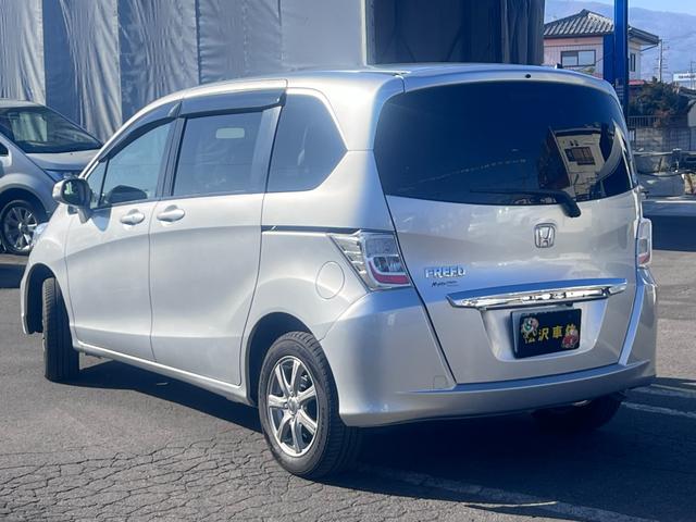 フリード Ｇ　ジャストセレクション　両側パワスラ　６人乗り　ナビ　ワンセグ　フリップダウンモニター　バックカメラ　クルコン　ＨＩＤヘッドライト　オートライト　ＥＴＣ　横滑り防止　エアコン　パワステ　ＡＢＳ　スマートキー（7枚目）
