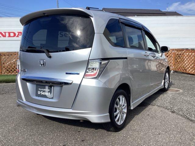 フリードハイブリッド ジャストセレクション 社外フルセグナビ/ブルートゥース HIDヘッドライト 社外AW 片側パワースライドドア(7枚目)