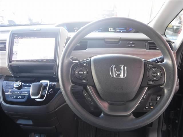 フリードハイブリッド ハイブリッド・Ｇホンダセンシング☆純正９型ナビ☆バックカメラ　☆フリップダウンモニター☆フルセグＴＶ☆ホンダセンシング☆ＡＣＣ☆ＬＫＡＳ☆両側パワスラ☆ビルトインＥＴＣ☆前後ドラレコ付デジタルミラー☆ＬＥＤヘッドライト☆前席シートヒーター☆禁煙車★試乗予約承り中（4枚目）