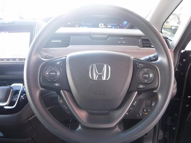 フリードハイブリッド ハイブリッド・Ｇホンダセンシング☆純正９型ナビ☆バックカメラ　☆フリップダウンモニター☆フルセグＴＶ☆ホンダセンシング☆ＡＣＣ☆ＬＫＡＳ☆両側パワスラ☆ビルトインＥＴＣ☆前後ドラレコ付デジタルミラー☆ＬＥＤヘッドライト☆前席シートヒーター☆禁煙車★試乗予約承り中（50枚目）