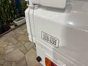 キャリイトラック KCパワステ農繁仕様 パートタイム4WD 高低二段切替式 (後輪駆動ベース) 全塗装 走行30,550キロ 1オーナー エアコン 三方開 アッパーメンバーガード リヤゲートチェーン デフロック 作業灯 AM/FMラジオ(7枚目)