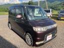 タント カスタムＸ　４ＷＤ　キーレスエントリー　ＨＩＤランプ　運転席・助手席エアバッグ　ＡＢＳ　ＣＤ　ＭＤ　エアコン　パワーステアリング　パワーウインドウ（7枚目）