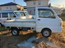 キャリイトラック ＫＣエアコン・パワステ　４ＷＤ　５速マニュアル車　エアコン　運転席エアバッグ　パワーステアリング　ＦＭ／ＡＭラジオ　切り替え式４ＷＤ（7枚目）