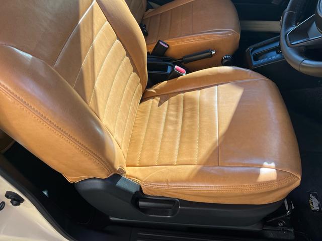 ジムニー XC 中古純正アルミスタッドレスセット付 エンジンスターター 社外アルミホイール オフロードタイヤ オプショングリル 革調社外シートカバー 8インチナビ バックカメラ アクティブクルコン シートヒーター(14枚目)