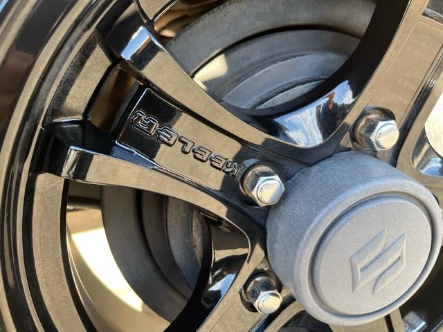 ジムニー XC 中古純正アルミスタッドレスセット付 エンジンスターター 社外アルミホイール オフロードタイヤ オプショングリル 革調社外シートカバー 8インチナビ バックカメラ アクティブクルコン シートヒーター(30枚目)