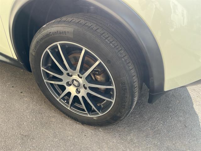 ジューク 15RX タイプV 車検2年付き 中古スタッドレスセット付き 純正ナビ TV Bluetooth リアスポイラー プッシュスタート スペアキー オートエアコン 社外17インチアルミホイール(14枚目)