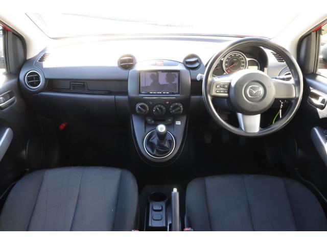 デミオ 13C 5速MT 純正ナビ TV キーレス 電動格納ドアミラー 衝突安全ボディ ABS CD エアコン パワーステアリング パワーウィンドウ(2枚目)