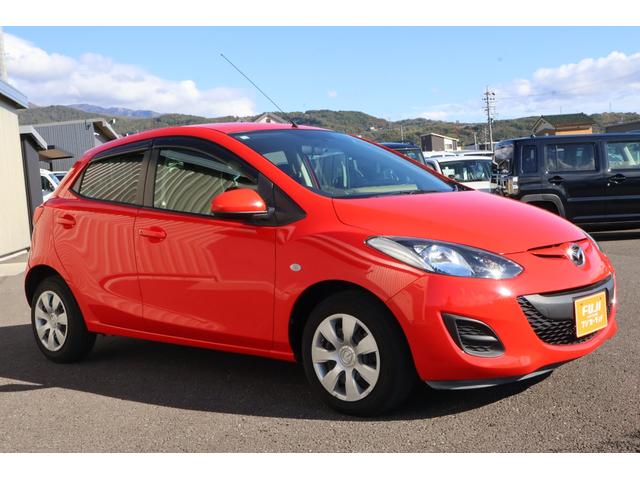 デミオ 13C 5速MT 純正ナビ TV キーレス 電動格納ドアミラー 衝突安全ボディ ABS CD エアコン パワーステアリング パワーウィンドウ(14枚目)