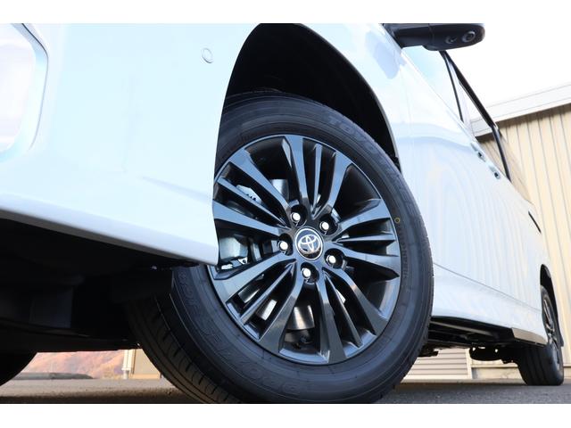 ヴォクシー Ｓ－Ｇ　登録済未使用車　４ＷＤ　純正１０．５ナビ　全方位モニター　フルセグＴＶ　両側パワスラ　ユニバーサルステップ　リアフリップダウン　チームメイトアドバンストパーク　快適利便ＭＩＤ　ＥＴＣ　シートヒーター（22枚目）