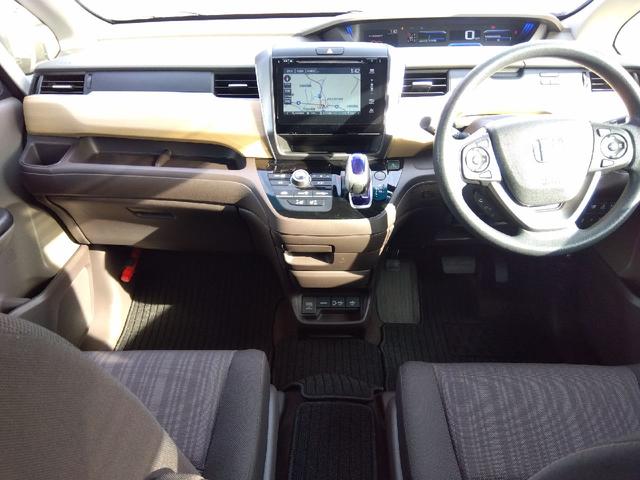 フリードハイブリッド ハイブリッド・Ｇホンダセンシング　ワンオーナー　４ＷＤ　衝突軽減ブレーキ　純正ナビ＆フルセグＴＶ＆バックカメラ　両面パワースライドドア　前席シートヒーター　車検令和８年１１月（2枚目）