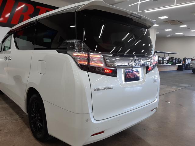 ヴェルファイアハイブリッド Ｘ　４ＷＤ　寒冷地仕様　フリップダウンモニター　レーダークルコン　前後ドラレコ　両側電動スライド　１５００Ｗ給電　８型ナビ　フルセグＴＶ　バックカメラ　衝突軽減　オートライト　ＬＥＤヘッドライト（67枚目）