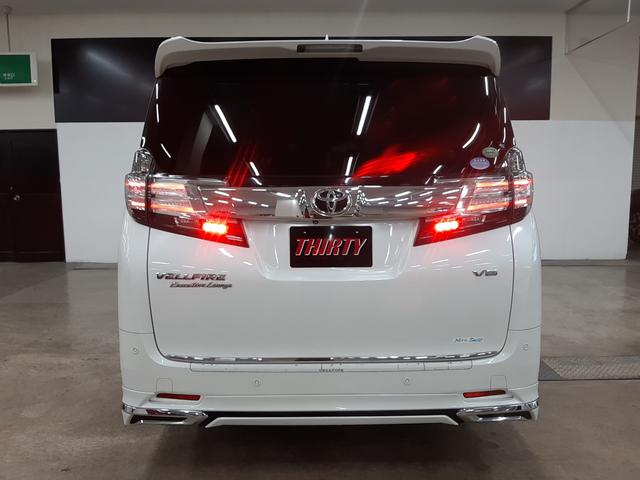 ヴェルファイア 3.5エグゼクティブラウンジ 4WD 寒冷地 モデリスタエアロ 2サンルーフ レーダークルコン 黒革電動シート ドラレコ シートヒーター 両側電動スライド 後席温熱冷感シート フリップダウンモニター 電動バックドア ステアヒーター(70枚目)