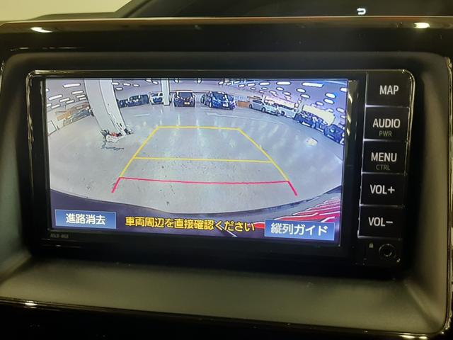 ヴォクシー Ｘ　４ＷＤ　後期型　クルーズコントロール　電動スライドドア　ナビ　バックカメラ　リヤオートエアコン　クリアランスソナー　ＬＥＤヘッドライト　衝突軽減ブレーキ　オートマチックハイビーム　Ｂｌｕｅｔｏｏｔｈ（3枚目）