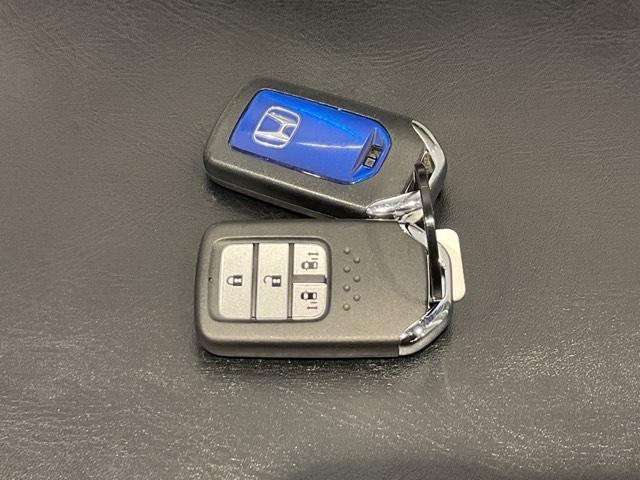 フリードハイブリッド ハイブリッド・Gホンダセンシング メモリーナビ リアカメラ ETC 軽減ブレーキ キーフリーシステム DVD再生可能 ECON 後カメラ Aクルーズ 地デジフルセグTV LEDヘッドランプ 横滑防止 パワーウインドウ 3列シート(31枚目)