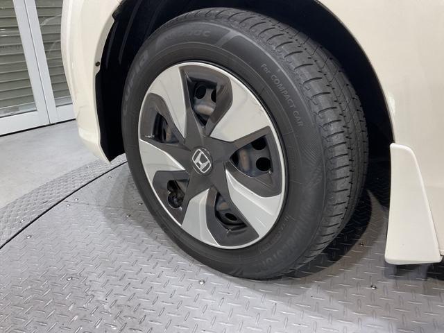 フィットハイブリッド Lホンダセンシング 【いまコレ+】新品フロアマット 軽減ブレーキ Rカメ LED サイドSRS 横滑り防止 フルセグテレビ ナビTV パワーステアリング 盗難防止装置 オートクルーズ ETC車載器 DVD再生 ABS(34枚目)