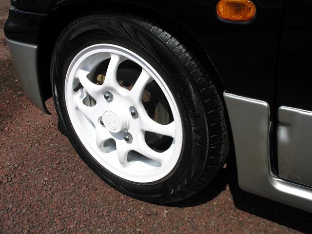 アルトハッスル Ｓｔ　アルトワークス仕様カスタムカー　ワークス用ステアリング＆ボンネット＆マスク＆バンパー＆サイドパネル＆ヘッドライト＆フォグランプ　ワークスカラーに色替オールペイント済　１３インチホワイトアルミリペア済み（27枚目）