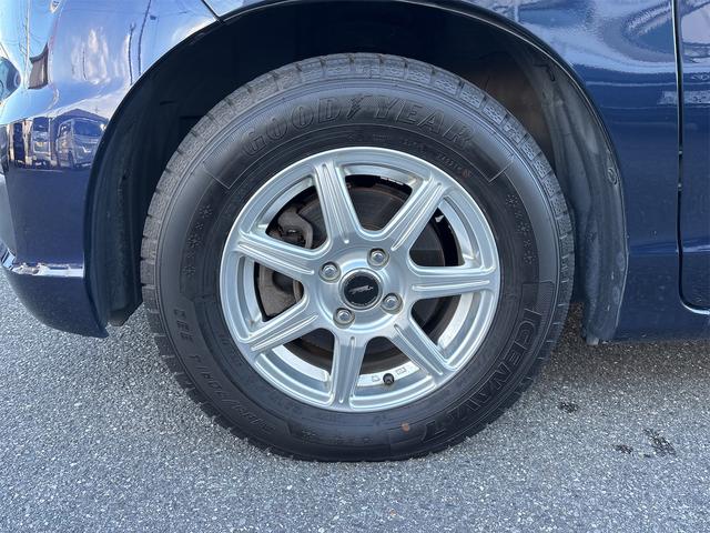 フリードスパイク Ｇ　ジャストセレクション　ナビ・ＴＶ　ＥＴＣ車載器　左側電動スライドドア　バックカメラ　ＨＩＤヘッドライト　オートライト　フルフラット　運転席・助手席エアバック　オートエアコン　キーレスエントリー　ドアバイザー（12枚目）