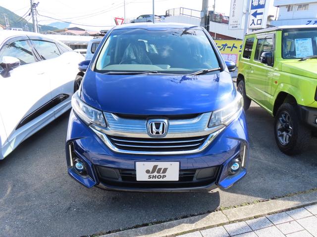 フリードハイブリッド ハイブリッド・Gホンダセンシング ETC バックカメラ ナビ オートクルーズコントロール レーンアシスト 衝突被害軽減システム 両側電動スライドドア オートライト 3列シート AT ESC エアコン パワーステアリング(2枚目)