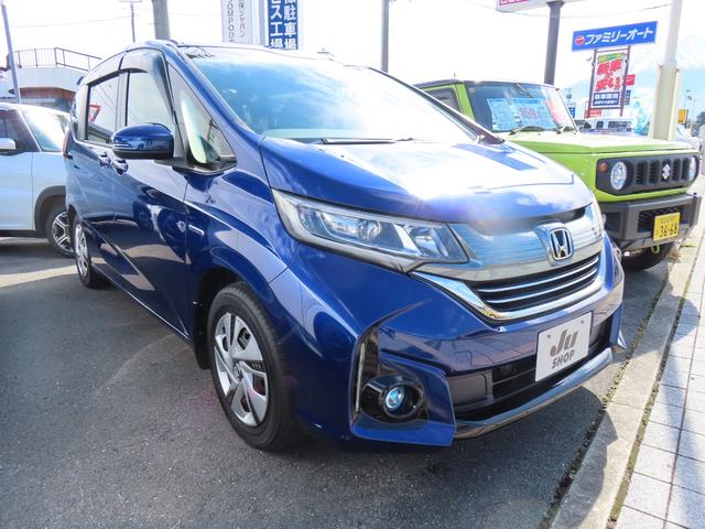 フリードハイブリッド ハイブリッド・Gホンダセンシング ETC バックカメラ ナビ オートクルーズコントロール レーンアシスト 衝突被害軽減システム 両側電動スライドドア オートライト 3列シート AT ESC エアコン パワーステアリング(3枚目)