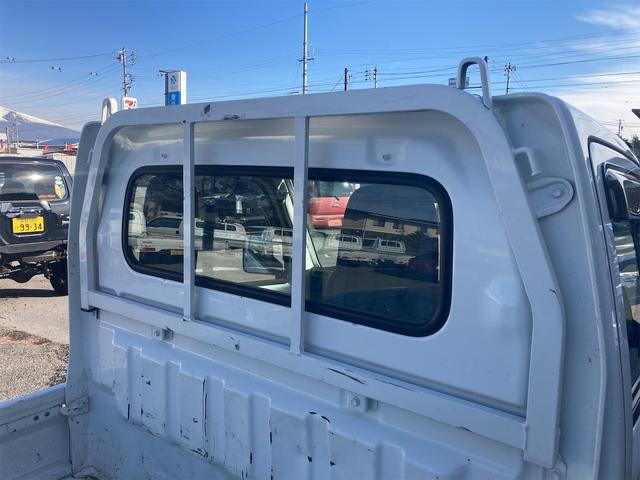 KC 4WD 5速マニュアル エアコン パワーステアリング 三方開 修復歴無し 保証付き 走行距離50986キロ 車検整備付き 運転席エアバッグ ドアバイザー フロアマット ヘッドライトレベライザー ラジオ(7枚目)