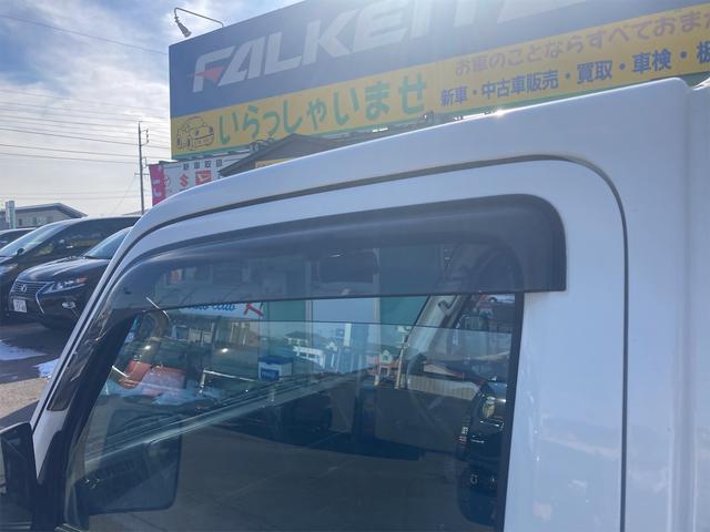 KC 4WD 5速マニュアル エアコン パワーステアリング 三方開 修復歴無し 保証付き 走行距離50986キロ 車検整備付き 運転席エアバッグ ドアバイザー フロアマット ヘッドライトレベライザー ラジオ(41枚目)