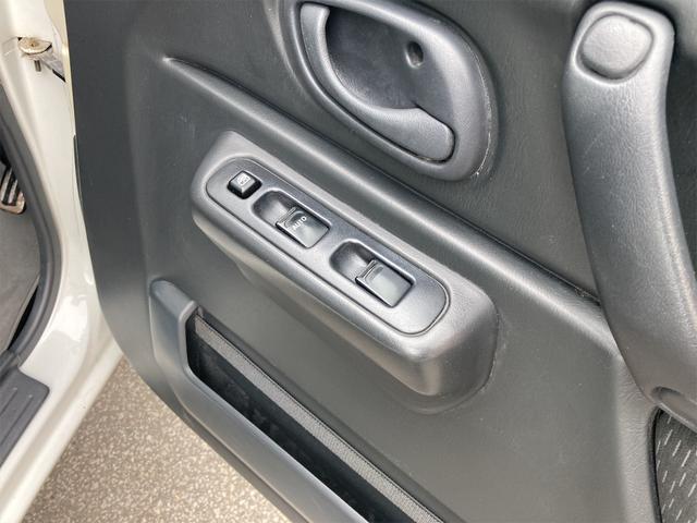 XC パワーウィンドー 電動格納式ドアミラー CDステレオ ABS付 WSRS 運転席エアバッグ 衝突安全ボディ AC パワステ キーレスリモコン ターボエンジン 切り替え4WD(22枚目)