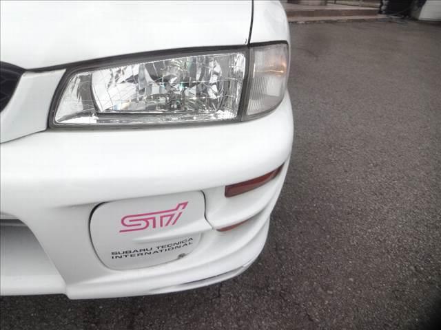 ＷＲＸタイプＲＳＴｉバージョンＶ禁煙車！ＡＰＥＸｉマフラー！　ワンオーナー！５速ＭＴ！ＳＴＩタワーバー！ＭＯＭＯステアリング！ＡＰＥＸｉマフラー／ブースト計！エアクリ！ケンウッドウーファー／リヤスピーカー！カロッツェリアナビ！フルセグ！ＥＴＣ！タイベル交換済！(18枚目)